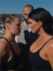 Rhonda Rousey and Gina Carano facing each other