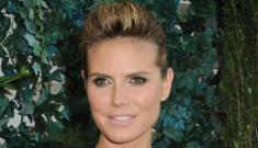 Is Heidi Klum pregnant for the fifth time, or is she just wearing a horrible jumper?