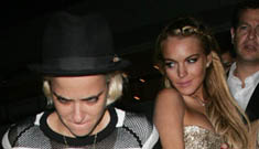 Lindsay Lohan and Samantha Ronson hold hands at Diddy’s party