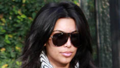 Kim Kardashian blames her blown up lips on the flu