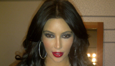 “Kim Kardashian poses in a tacky bikini, ugly lipstick”   links