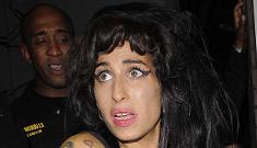 Winehouse still at it: Amy slaps a fan in the face