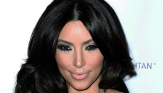 Kim Kardashian’s kat-face looks completely normal, by the way