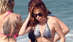 Miley Cyrus in a bikini & her mom’s giant back tattoo: cool or regrettable?