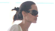 Angelina earns her pilot’s license, buys plane