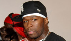 50 Cent punches out a fan at a fashion show