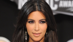Kim Kardashian in metallic Kaufman Franco: too small,   too unfortunate?