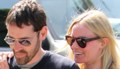 Kate Bosworth does an obvious, “coy” photo op with her boyfriend