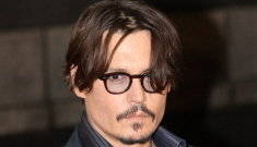Johnny Depp is having a “mini midlife crisis” and Vanessa Paradis is tired of it
