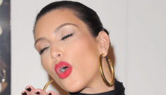 Kim Kardashian in black at a QVC event: busted, budget Armenian Barbie?