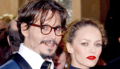Is Johnny Depp trying to reconcile with Vanessa during a family vacation?