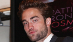 Robert Pattinson rings the bell at the NY Stock Exchange, looks brooding & hot