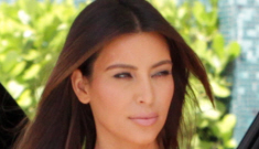 Kim Kardashian goes braless in a Lanvin sheet-dress:   trashy or sexy?
