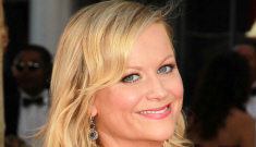 Is Amy Poehler drowning her sorrows in booze & bittersweet smiles?
