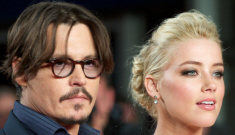 Johnny Depp & Amber Heard were seen looking “flirty” together in LA