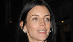 Liberty Ross goes braless in a navy silk suit in London: lovely or trashy?