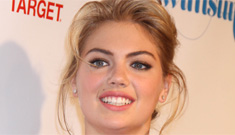 “Kate Upton adjusts her girls in a tight-fitting red dress” links