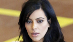 Kim Kardashian in an all-white ensemble in Paris: terrible televangelist-chic?