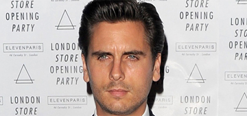Scott Disick poses with a pile of money atop Khloe Kardashian: rude or just dumb?