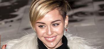 Miley Cyrus wore a giant ‘fur’ coat & Twitter had a meltdown over it