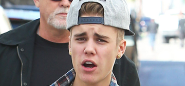 Justin Bieber grins proudly for mug shot, says his mom gave him drugs
