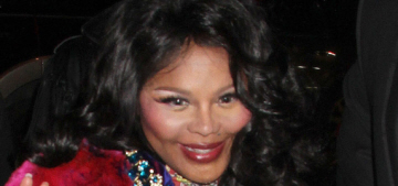 Lil Kim, 39, debuts her noticeable baby bump at NYFW: ‘I’m so excited!’