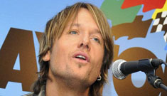 Keith Urban & Tom Cruise attend Daytona, try to ignore each other