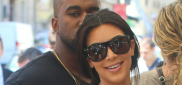 Kim Kardashian wore a weird swimsuit & a suede skirt in Paris: inappropriate or cute?