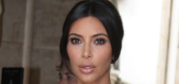 E! reveals Kim Kardashian’s Givenchy wedding gown, wall of flowers