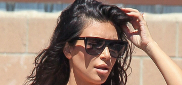 Kim Kardashian steps out in a black skirt & white tank: flattering or tragic?