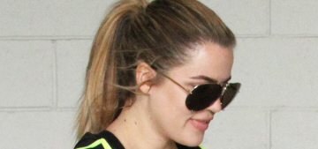 Khloe Kardashian is super-proud of her butt implants for some reason