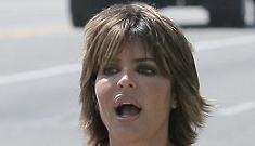 Lisa Rinna campaigns with a sandwich board to be on Melrose Place