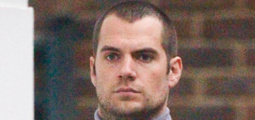 Henry Cavill in London with a shaved head, lavender turtleneck: hot or not?