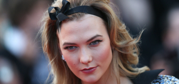 Karlie Kloss in Louis Vuitton, with a bump-it, in Cannes: retro-chic or terrible?