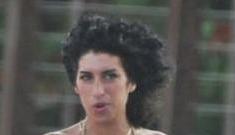 Amy Winehouse goes straight from her hospital bed to the bar