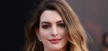 Anne Hathaway is all about post-baby body positivity & thigh-covering shorts