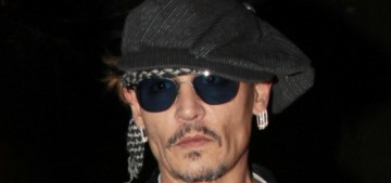 Johnny Depp employs someone full-time to feed his lines to him on set?