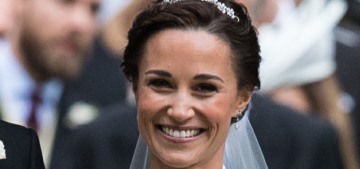Pippa Middleton wore a lacy, high-necked Giles Deacon wedding gown