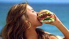 Audrina Patridge’s gold bikini promotes giant hamburger