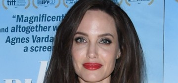 Please enjoy these photos of Angelina Jolie wearing a blanket to a premiere