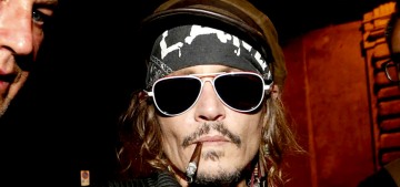 Johnny Depp & his former managers came to terms on an out-of-court settlement