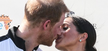 Prince Harry & Duchess Meghan shared a sweet & sweaty kiss at the polo match