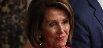 Why was the color of Nancy Pelosi’s dress noted in the New York Times’ headline?