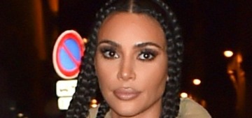 Kim Kardashian & Kanye are getting along, seem ‘happier’ after their family trip