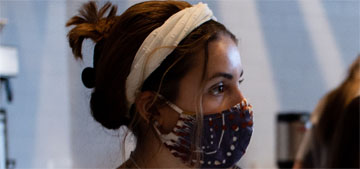 Experts say that people should continue wearing masks inside
