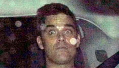 Robbie Williams cries after his driver runs over teenage paparazzo