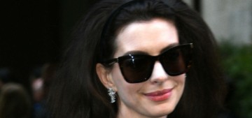 Anne Hathaway wore all-black & teased up hair to the Armani show: chic?
