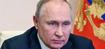 Is Vladimir Putin in poor health?  He looks puffy and he seems to have tremors.