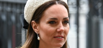 Duchess Kate repeated a white McQueen coatdress for the Anzac Day service