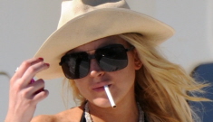 Lindsay Lohan shows off her bruises & her breasts in St. Barth